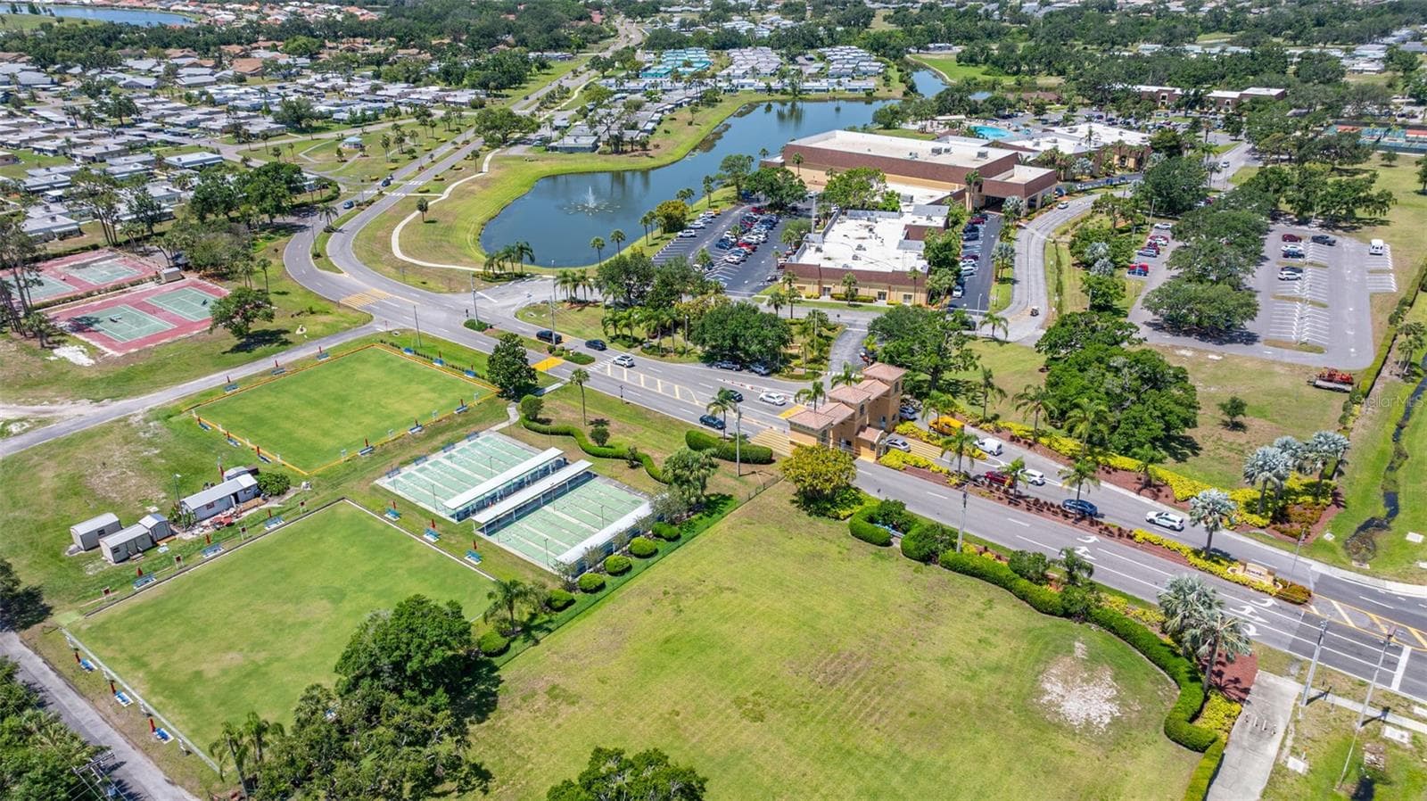 Welcome to Kings Point - Main Entrance, North Clubhouse and Sports Facilities - 1229 HUNTINGTON GREENS DR #12, SUN CITY CENTER