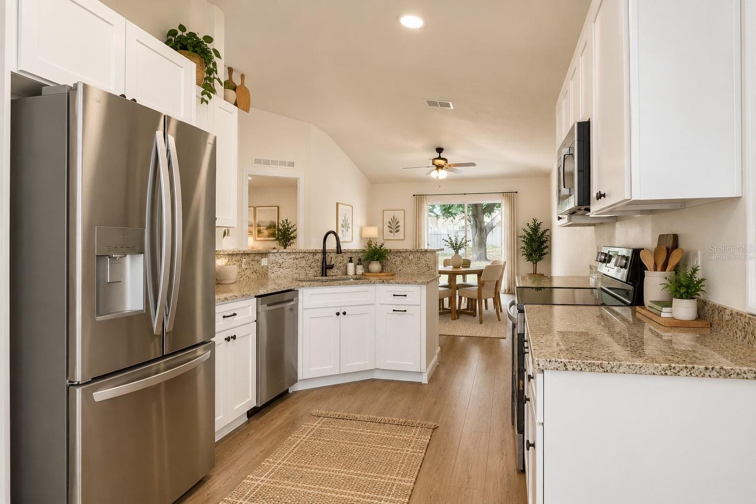 Kitchen-virtually staged - 140 MILESTONE DR, HAINES CITY
