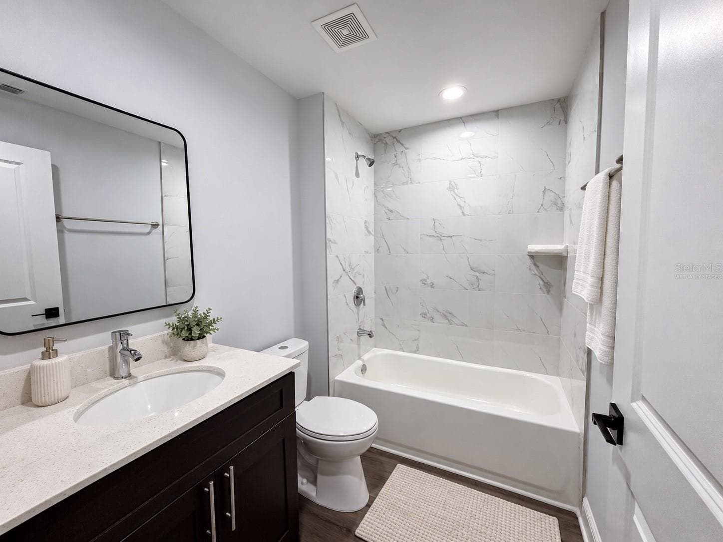 Tub bathroom - virtually staged - 11 DOGWOOD TRAIL CT, OCALA