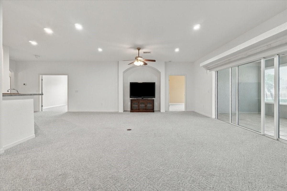 Open living room - 453 NOLANE LN, POLK CITY