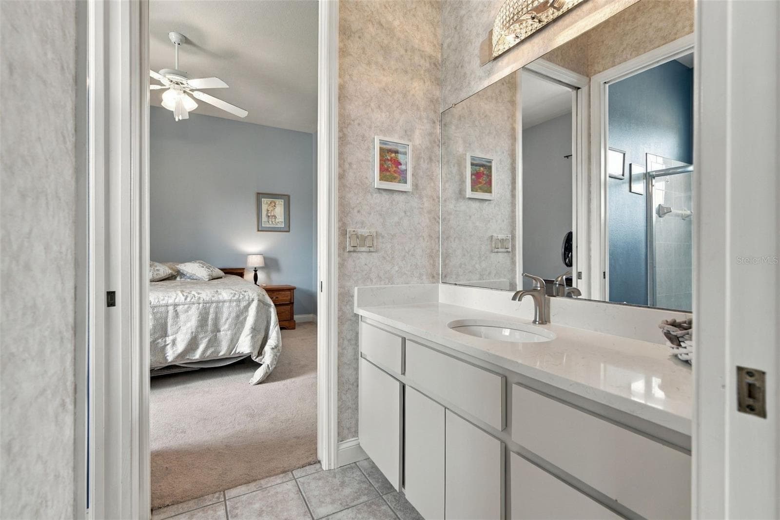 The 1/2 bath leads to the pool - 6722 W SENTINEL BLUFF PATH, BEVERLY HILLS