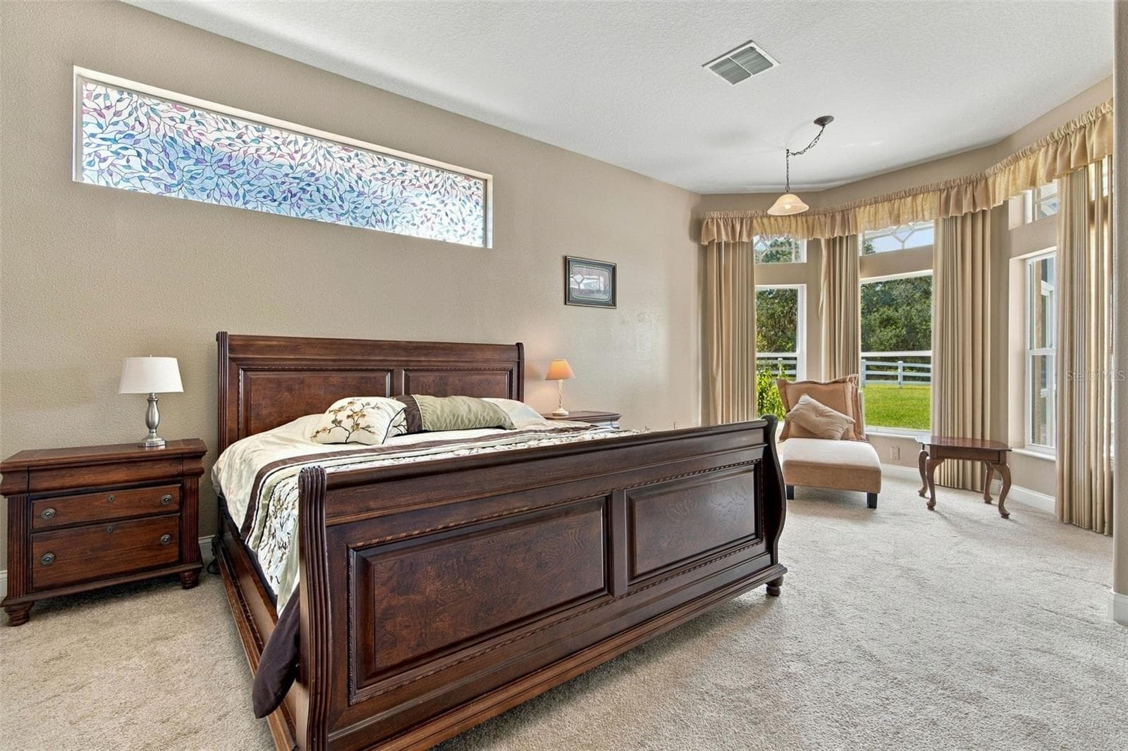 Beautiful light and bright primary bedroom - 6722 W SENTINEL BLUFF PATH, BEVERLY HILLS