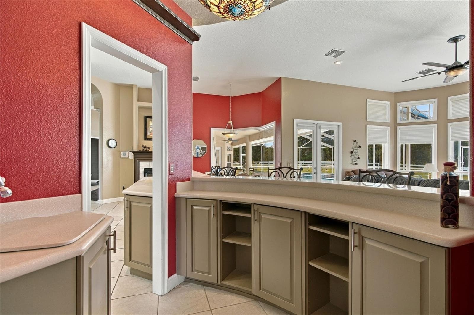 Convenient bar or workspace faces the family room. - 6722 W SENTINEL BLUFF PATH, BEVERLY HILLS