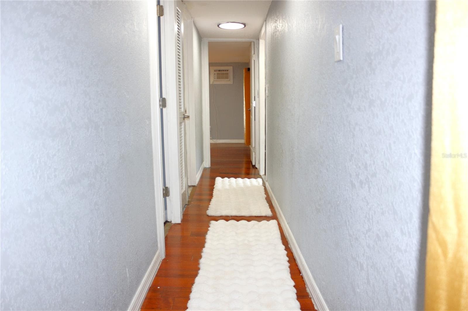 HALL TO BATHRROM AND ROOMS - 6905 AZLEE AVE, NEW PORT RICHEY