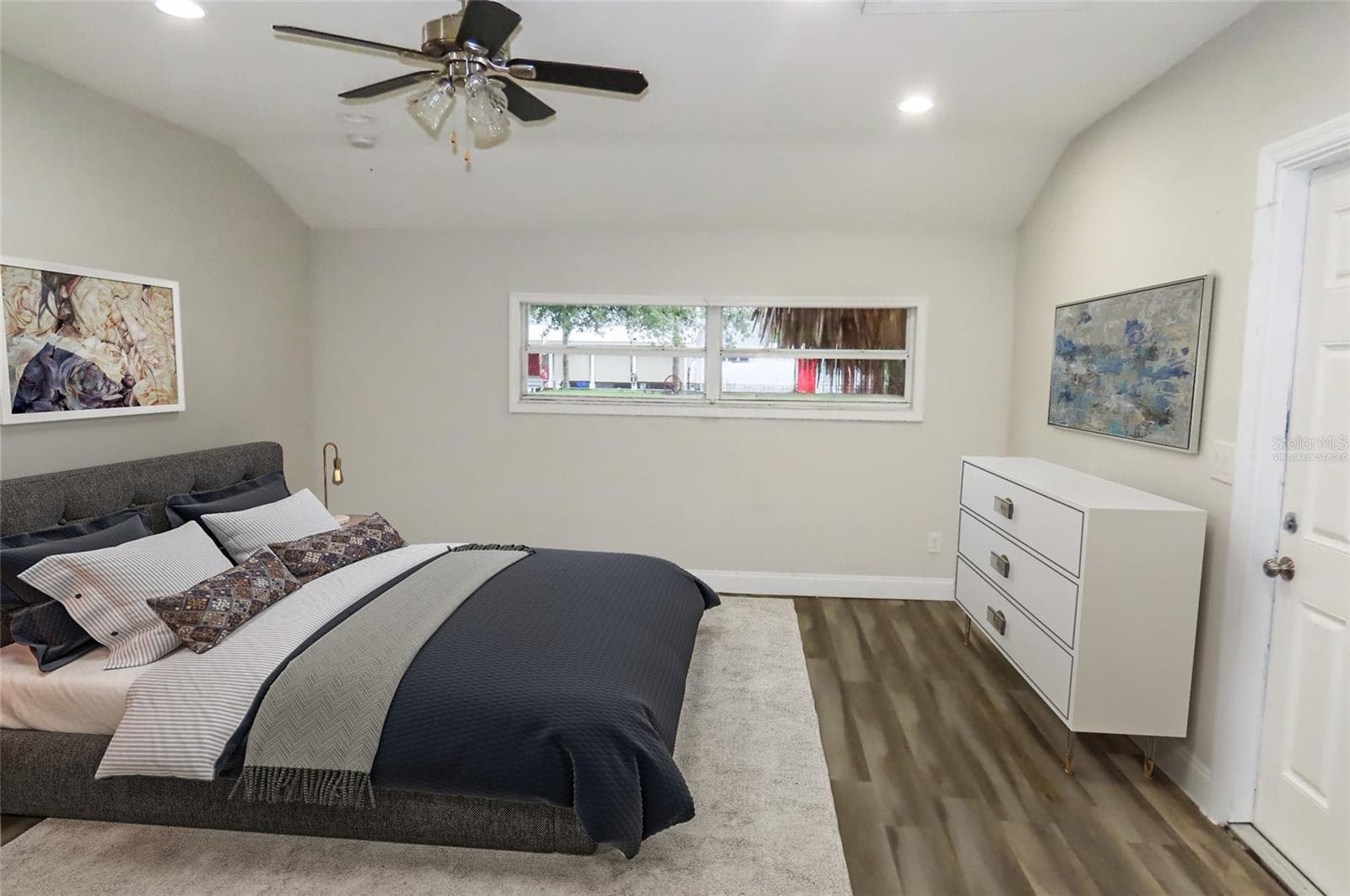 Virtually staged primary bedroom - 101 N GLENWOOD AVE, CLEARWATER