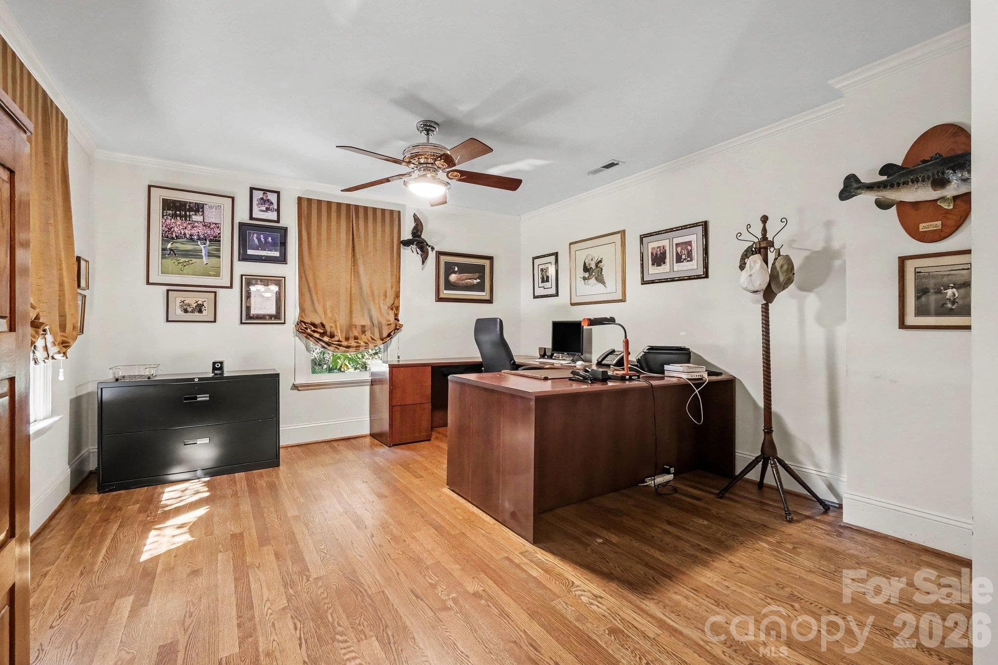 Versatile executive office connects to the library  - can also function as a nursery, playroom, collectibles showcase, or potential 5th bedroom (just add a wardrobe!) - 746 Grandview Drive NE, Concord