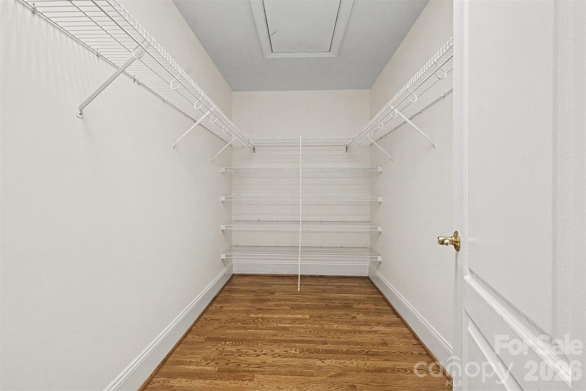 Large 65 sq ft walk-in storage closet on the main level perfect for pantry overstock and seasonal decor - 746 Grandview Drive NE, Concord