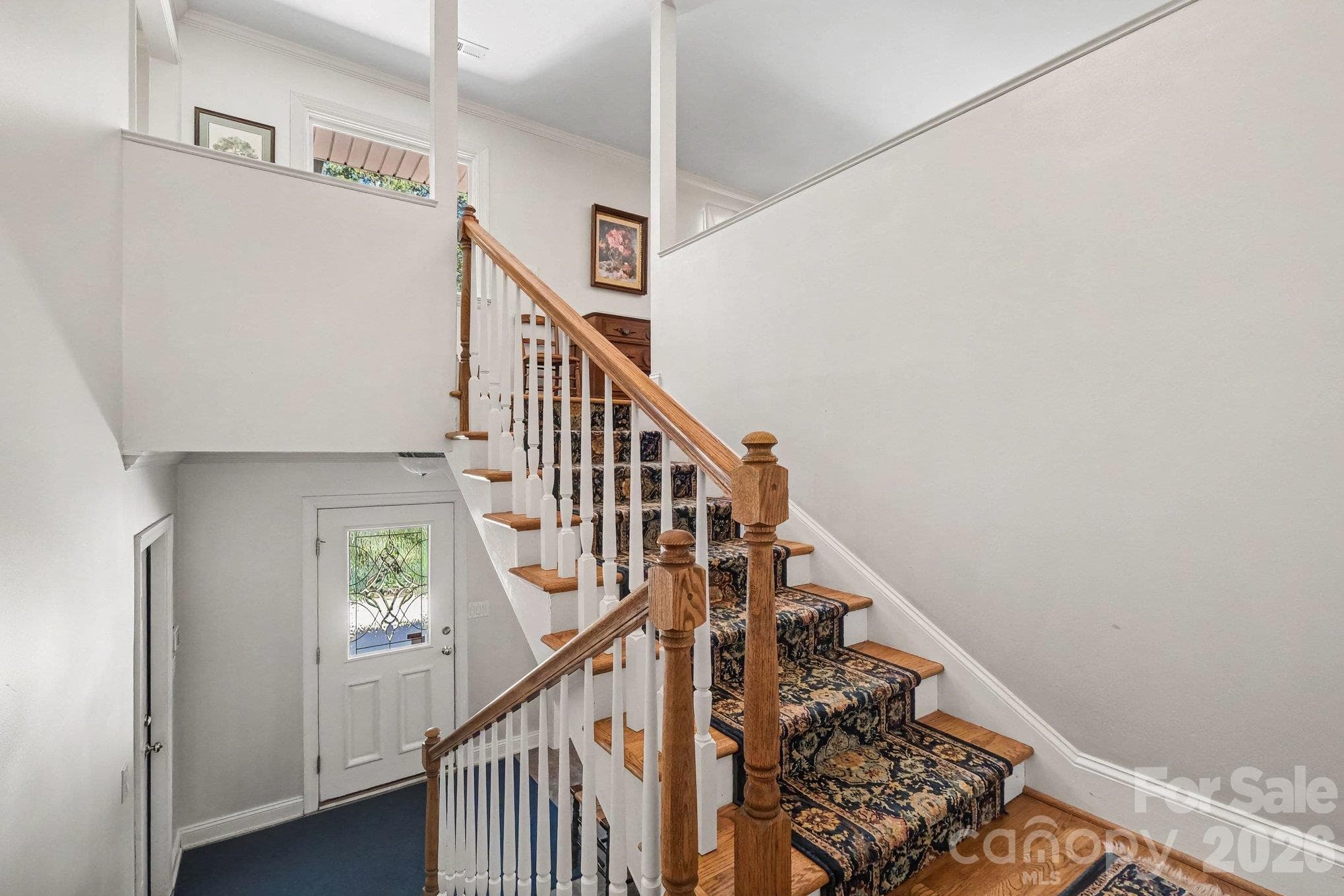 Wide, easy-rise stairs connect the main and lower level - 746 Grandview Drive NE, Concord