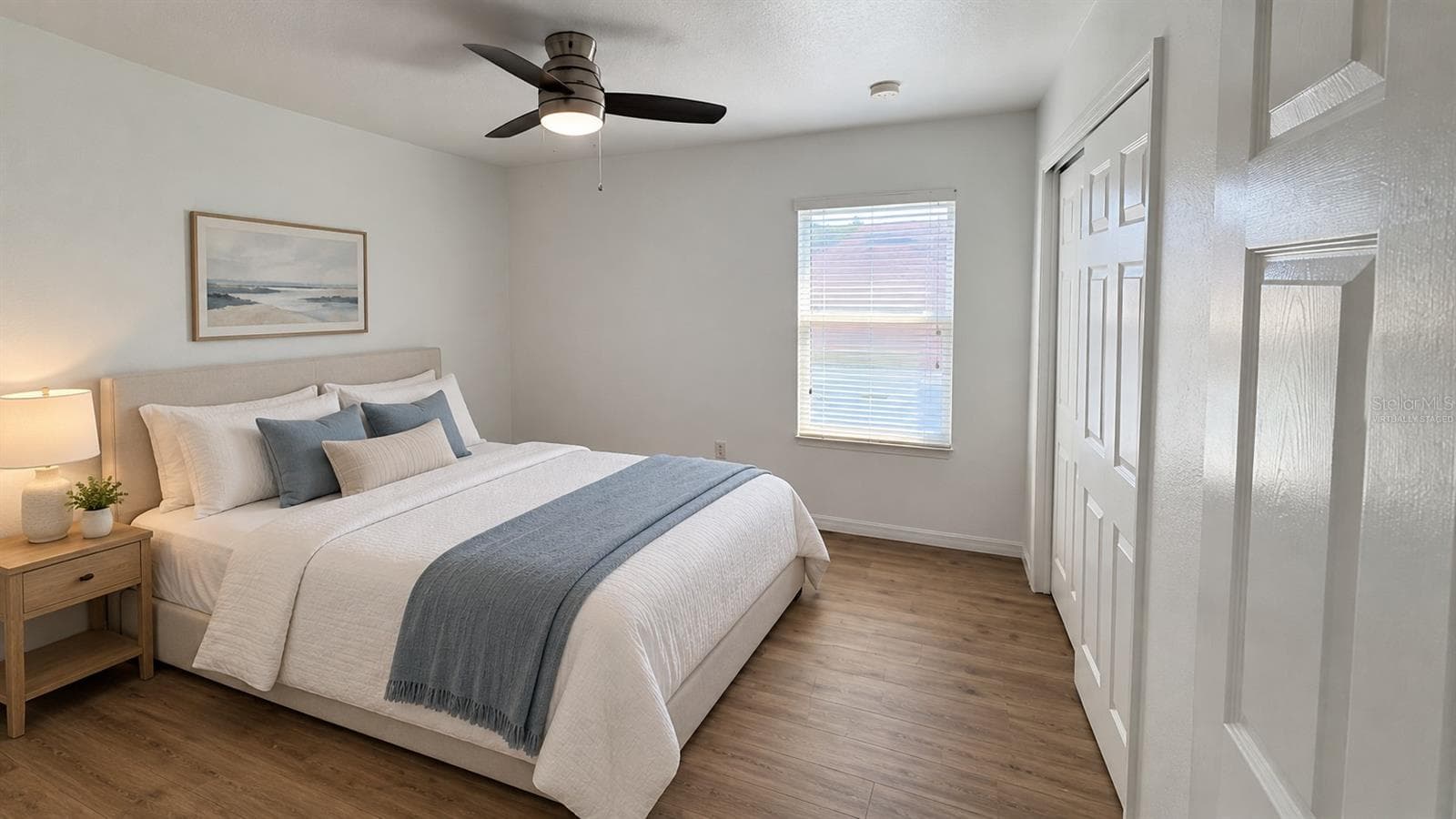 Virtually staged - Bedroom. Digital furniture and decor illustrate a possible layout; furnishings are not included. Original unstaged view retained. - 2255 SHEBOYGAN PL, KISSIMMEE