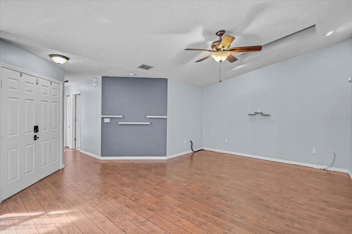 Living Room and Double Front Door - 7739 33RD LN E, SARASOTA