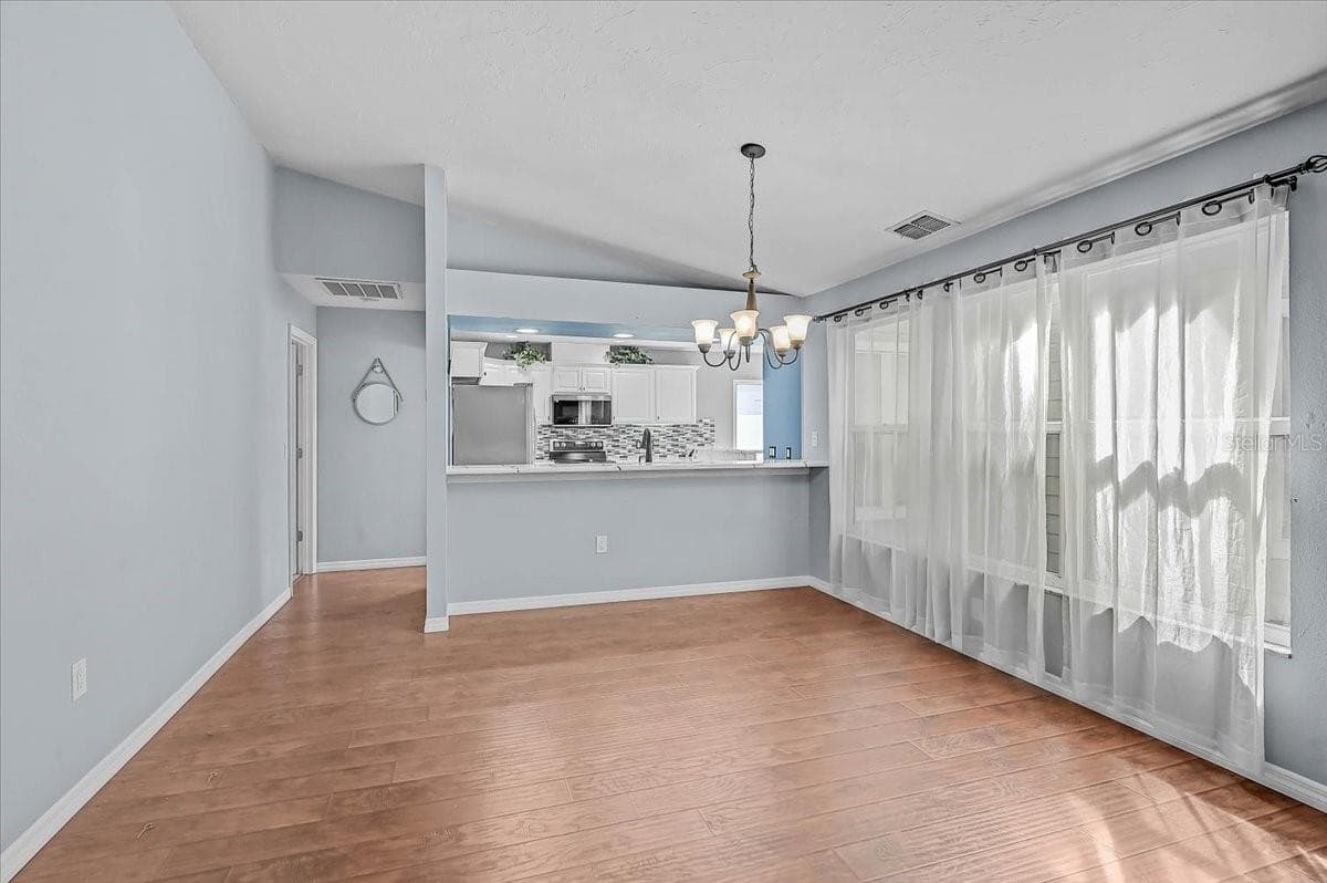 Dining Room and Kitchen - 7739 33RD LN E, SARASOTA