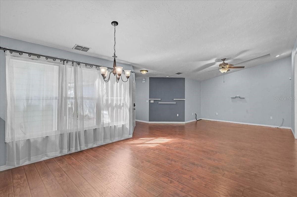 Dining Room Looking into Living Room - 7739 33RD LN E, SARASOTA