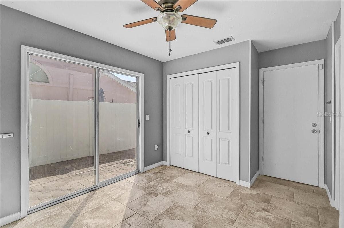 Dinette and Pantry to Garage Door and Sliding Door to Side Patio 35' x 9' - 7739 33RD LN E, SARASOTA