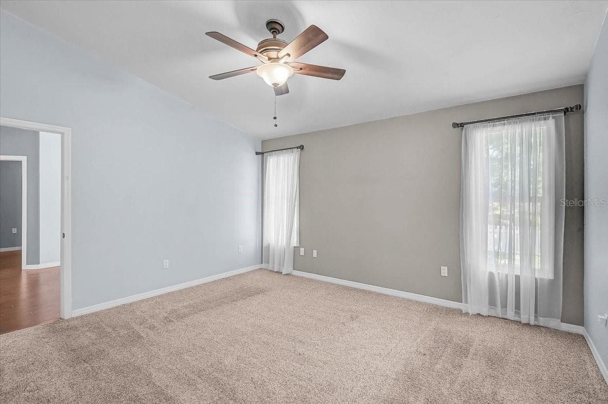 Primary Bedroom Overlooking Pond - 7739 33RD LN E, SARASOTA