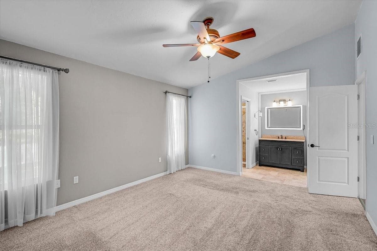 Primary Bedroom and Ensuite Bath - 7739 33RD LN E, SARASOTA