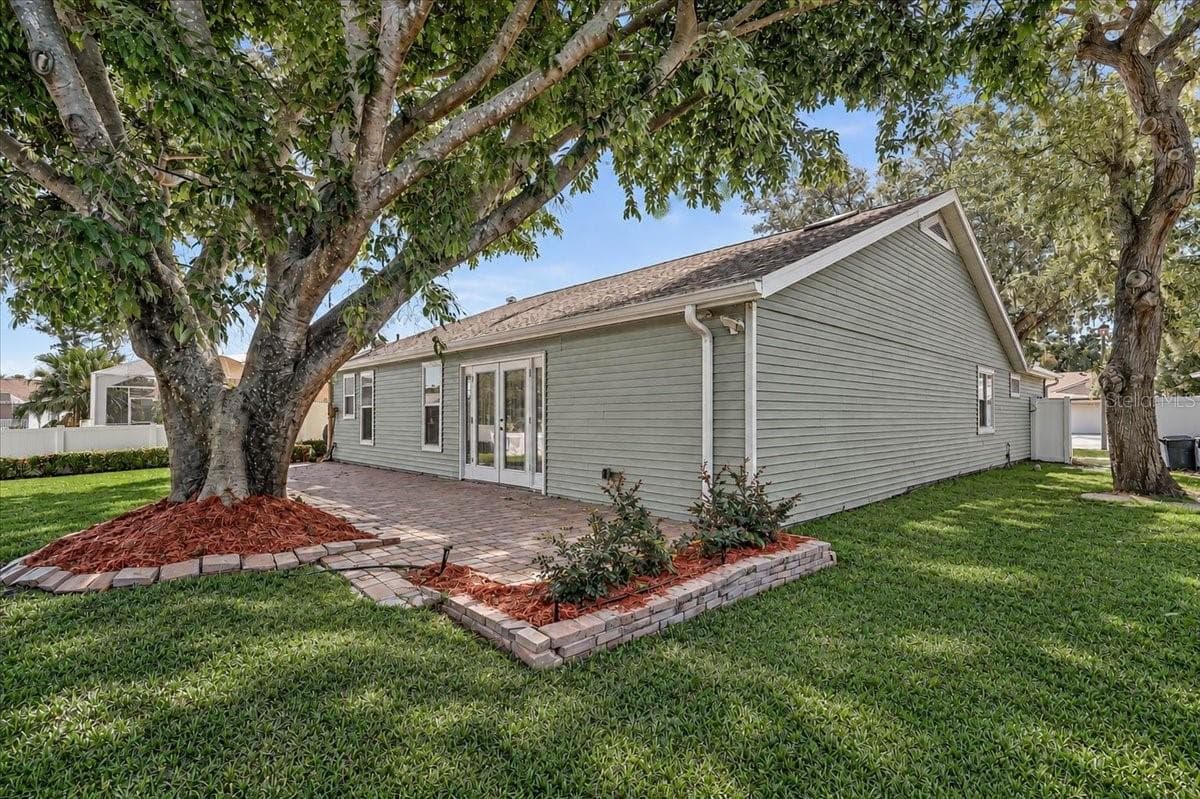 Rear Patio 44' x 10' at Pond - 7739 33RD LN E, SARASOTA