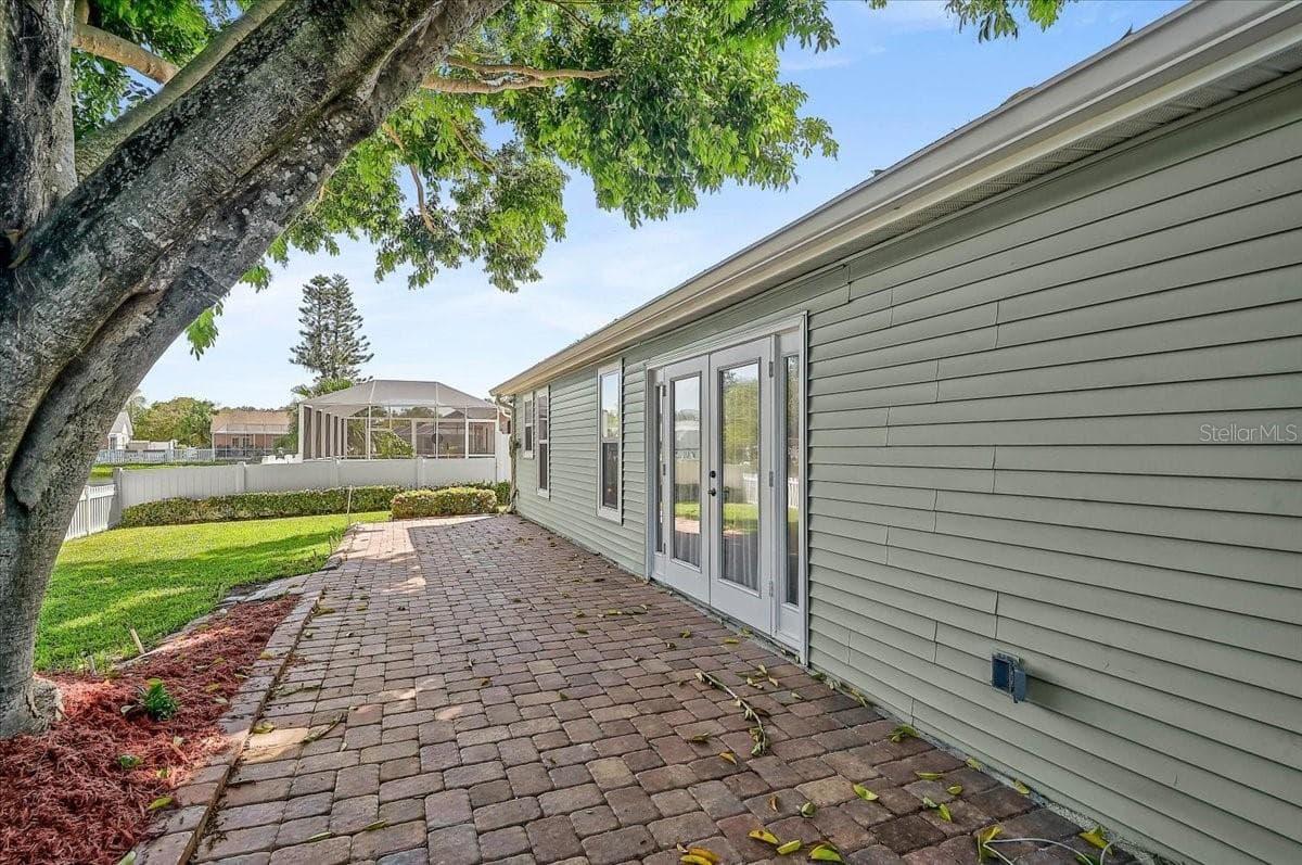 Rear Patio 44' x 10' at Pond - 7739 33RD LN E, SARASOTA