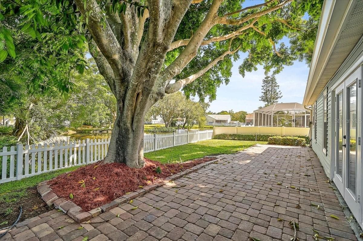Rear Patio 44' x 10' at Pond - 7739 33RD LN E, SARASOTA