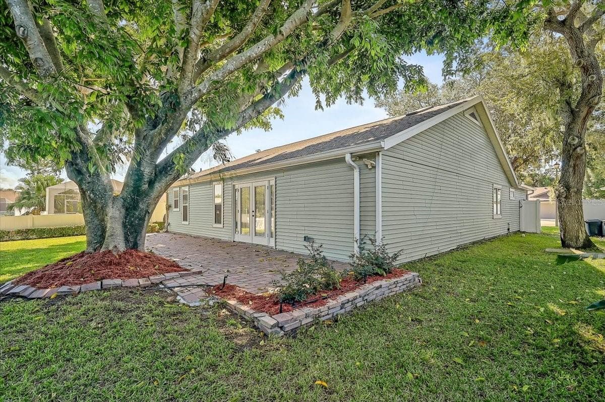 Rear Patio 44' x 10' at Pond - 7739 33RD LN E, SARASOTA