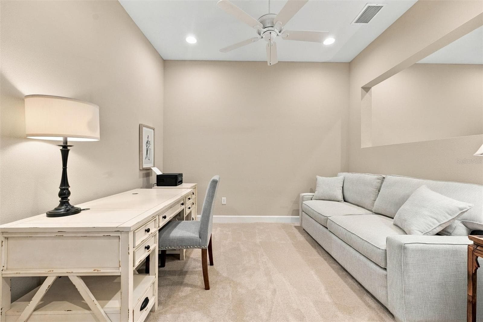 The versatile bonus room offers flexible living space—perfect for a home office, cozy den, or potential third bedroom to suit your needs. - 291 COMPASS POINT DR #201, BRADENTON