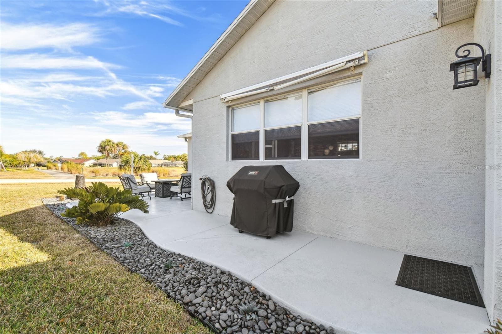 roll out awning over grill - 18325 DAVENTRY CT, HUDSON