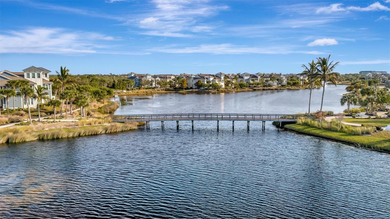 Enjoy two miles of scenic walking trails, perfect for getting outdoors and taking in the natural beauty of the community. - 291 COMPASS POINT DR #201, BRADENTON