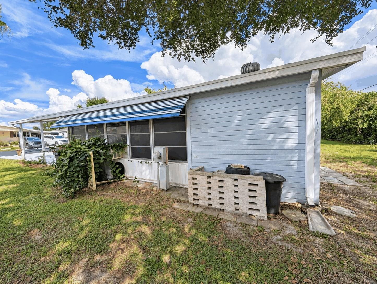 Side of Home - 6066 SE SOUTHERN OAKS DR, WINTER HAVEN