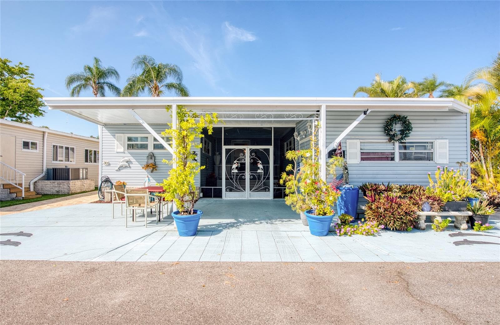 Mobile Home at 18675 US HIGHWAY 19 N #303, CLEARWATER, photo 2 of 42