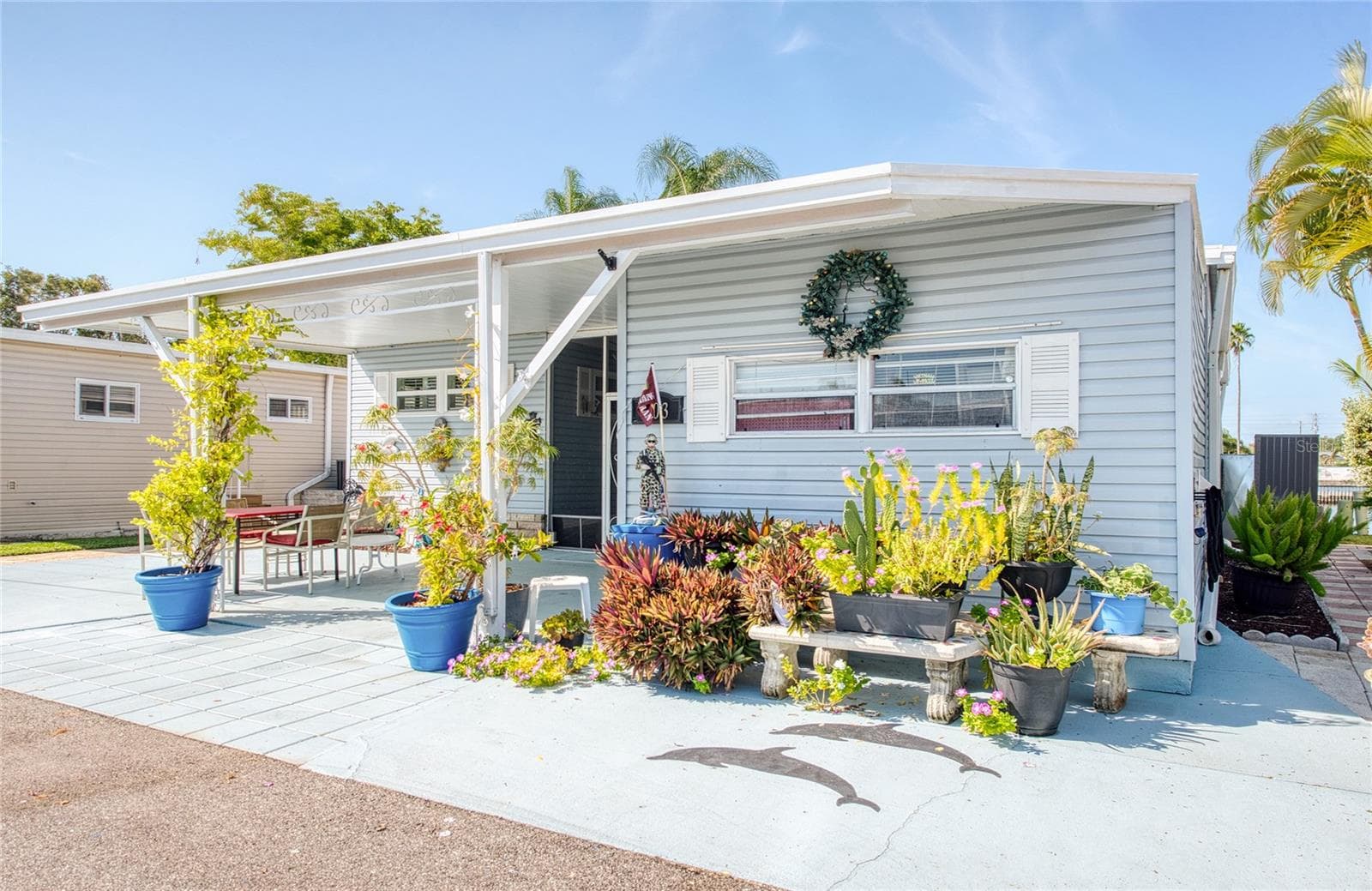 Mobile Home at 18675 US HIGHWAY 19 N #303, CLEARWATER, photo 3 of 42