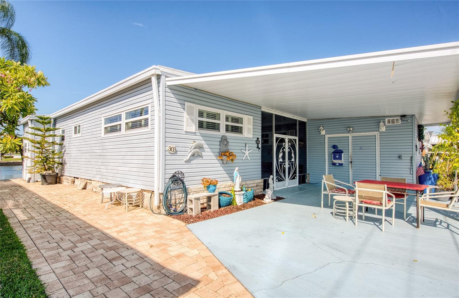 Mobile Home at 18675 US HIGHWAY 19 N #303, CLEARWATER, photo 5 of 42