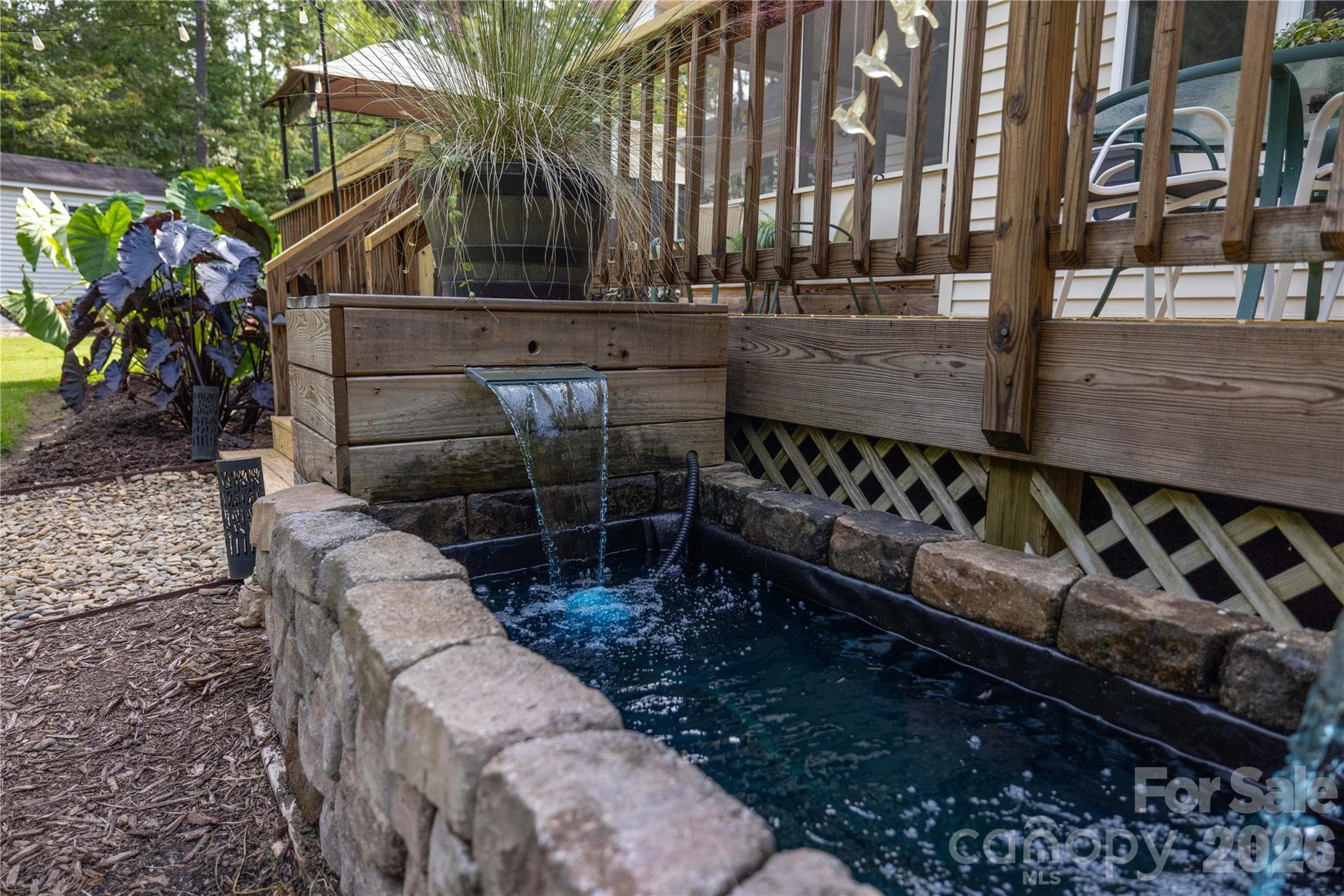 Sooth your soul listening to this water feature while enjoying nature outside on the deck - 571 Newport Drive, Mount Gilead