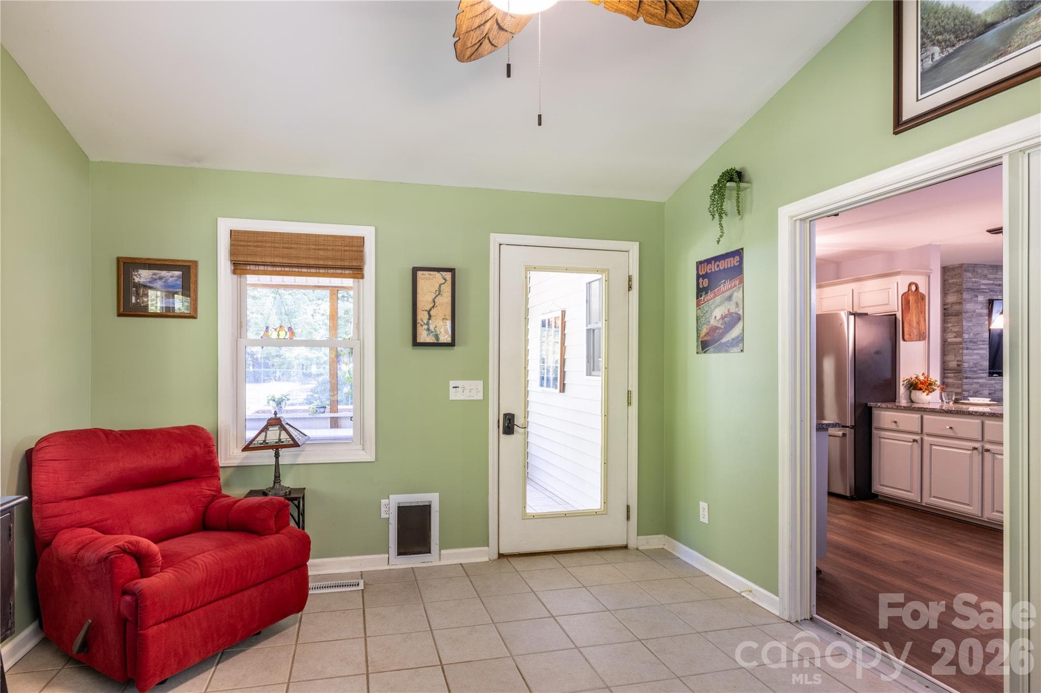 Entry door leads to sweet screened porch - 571 Newport Drive, Mount Gilead
