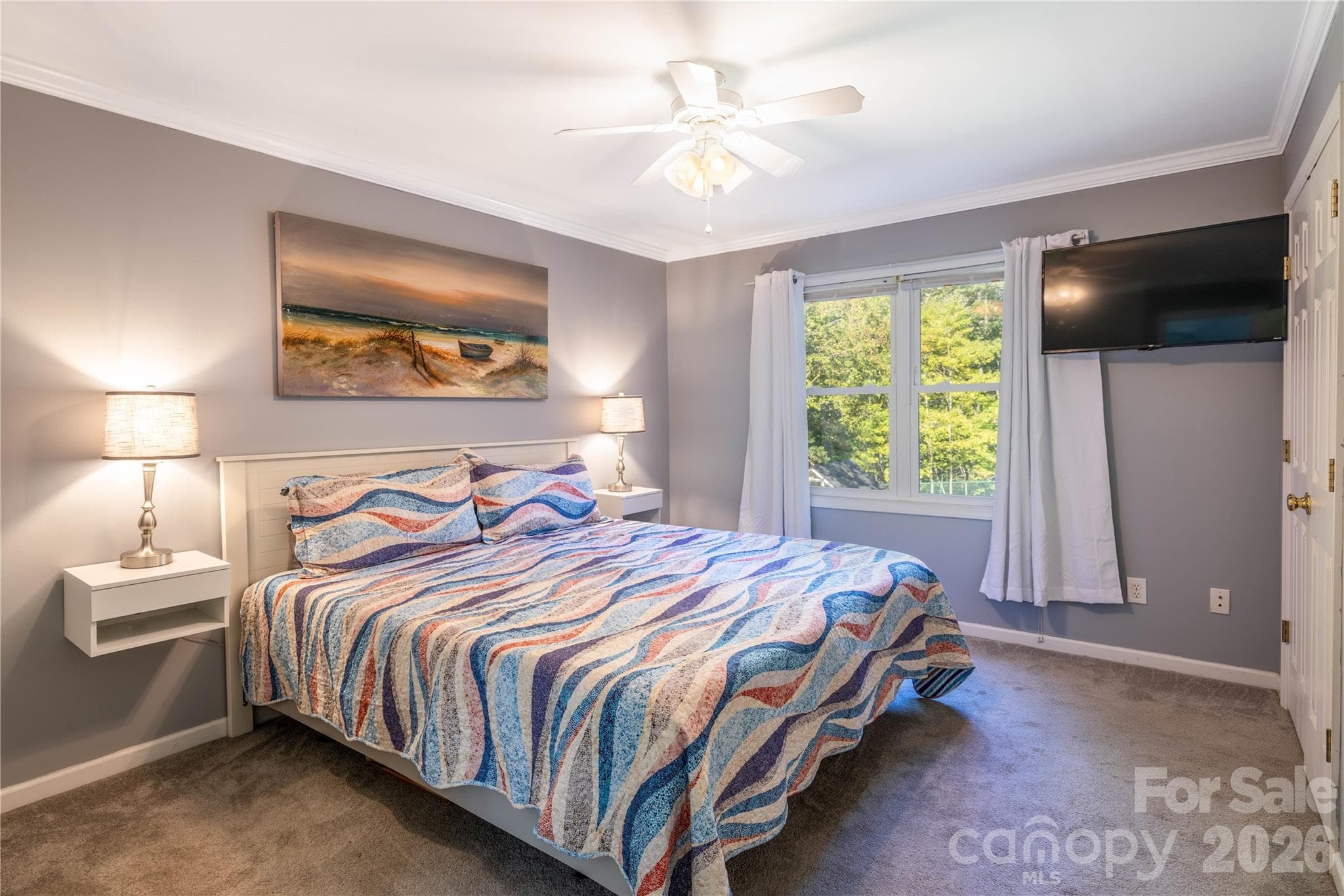 Primary Suite with windows overlooking manicure backyard - 571 Newport Drive, Mount Gilead