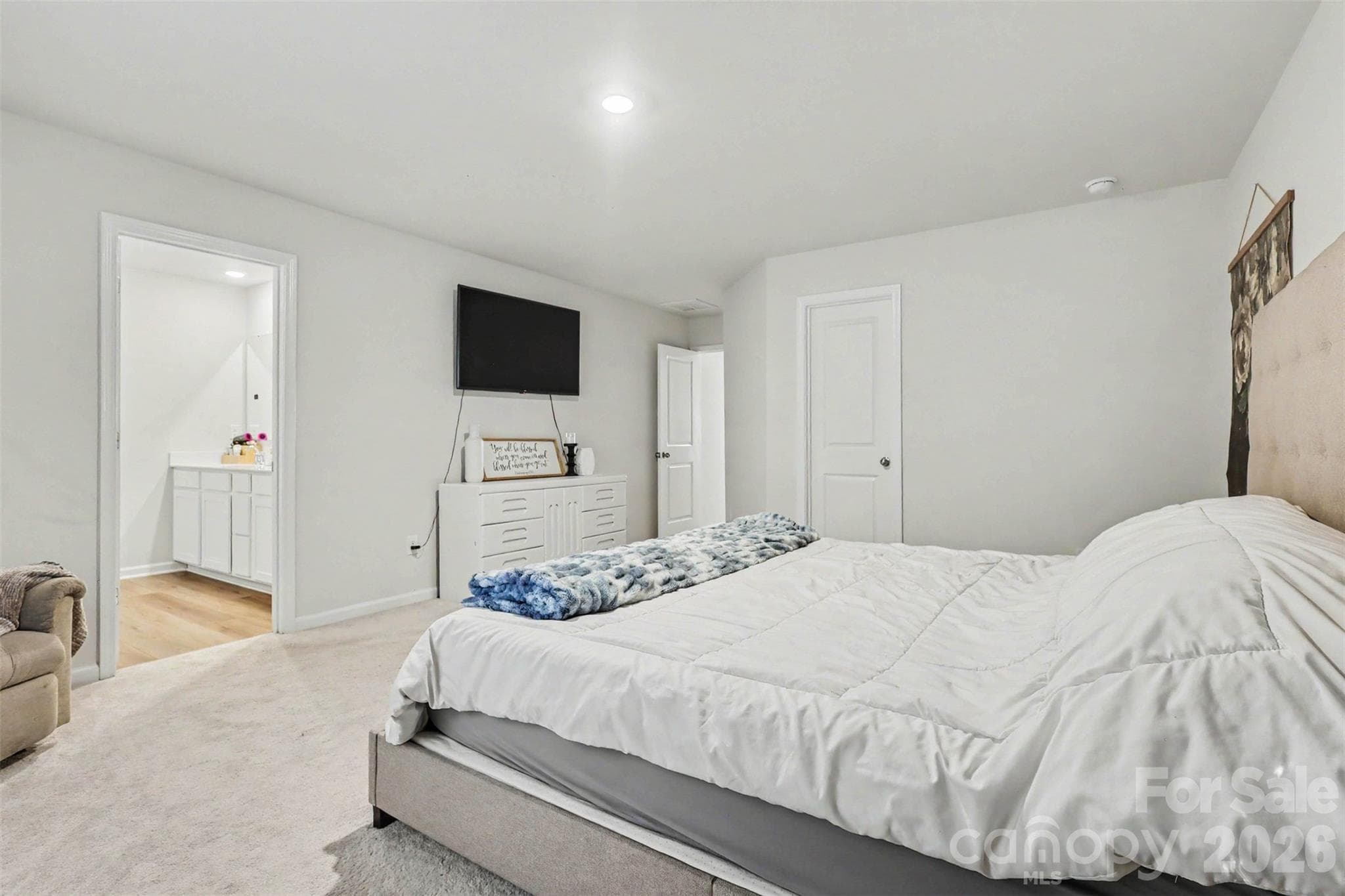 Another view of primary bedroom suite featuring first walk in closet - 149 Catawba Walk Way, Statesville