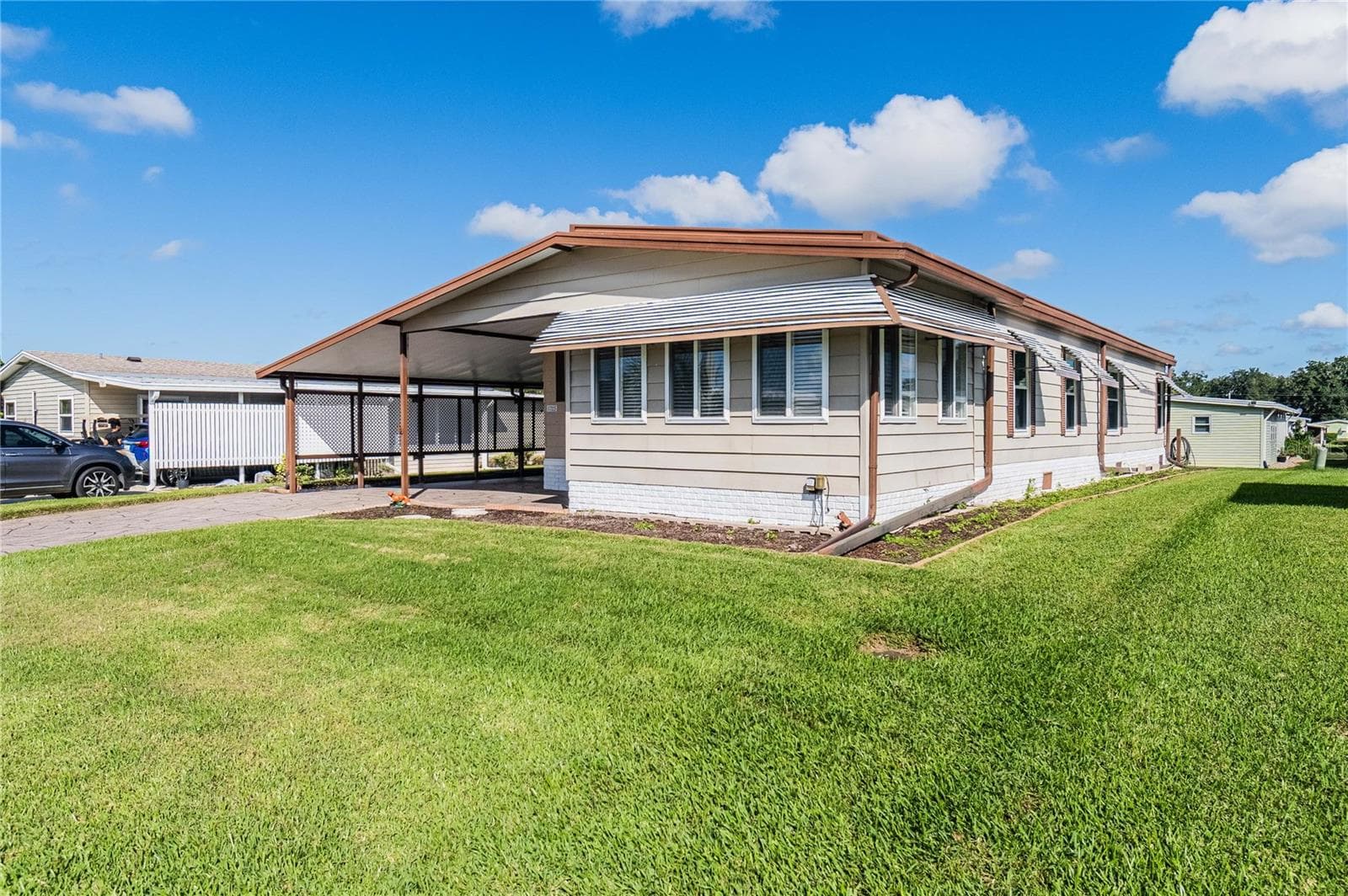 Manufactured Home at 1725 QUAIL HILL DR, LAKELAND, photo 2 of 26