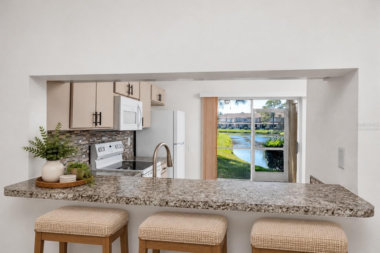 Breakfast Bar Virtually Staged -6229 Bayside Key Dr, Tampa, FL 33615 - 6229 BAYSIDE KEY DR, TAMPA