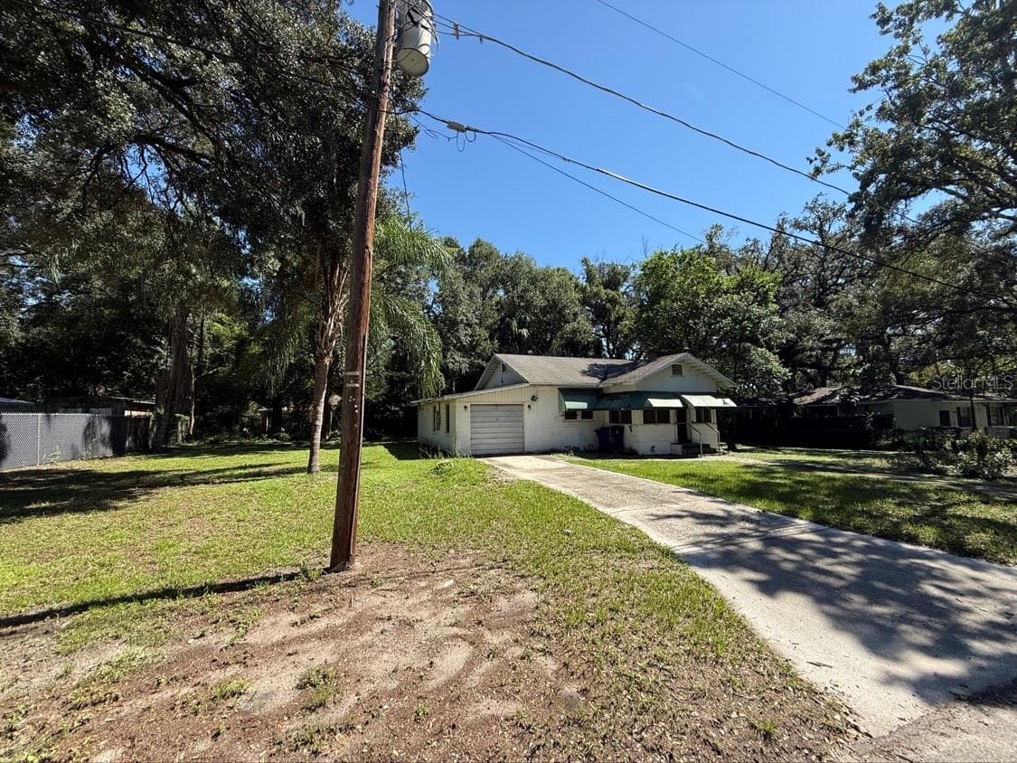 Single Family Residence at 10109 N JASMINE AVE, TAMPA, photo 6 of 28