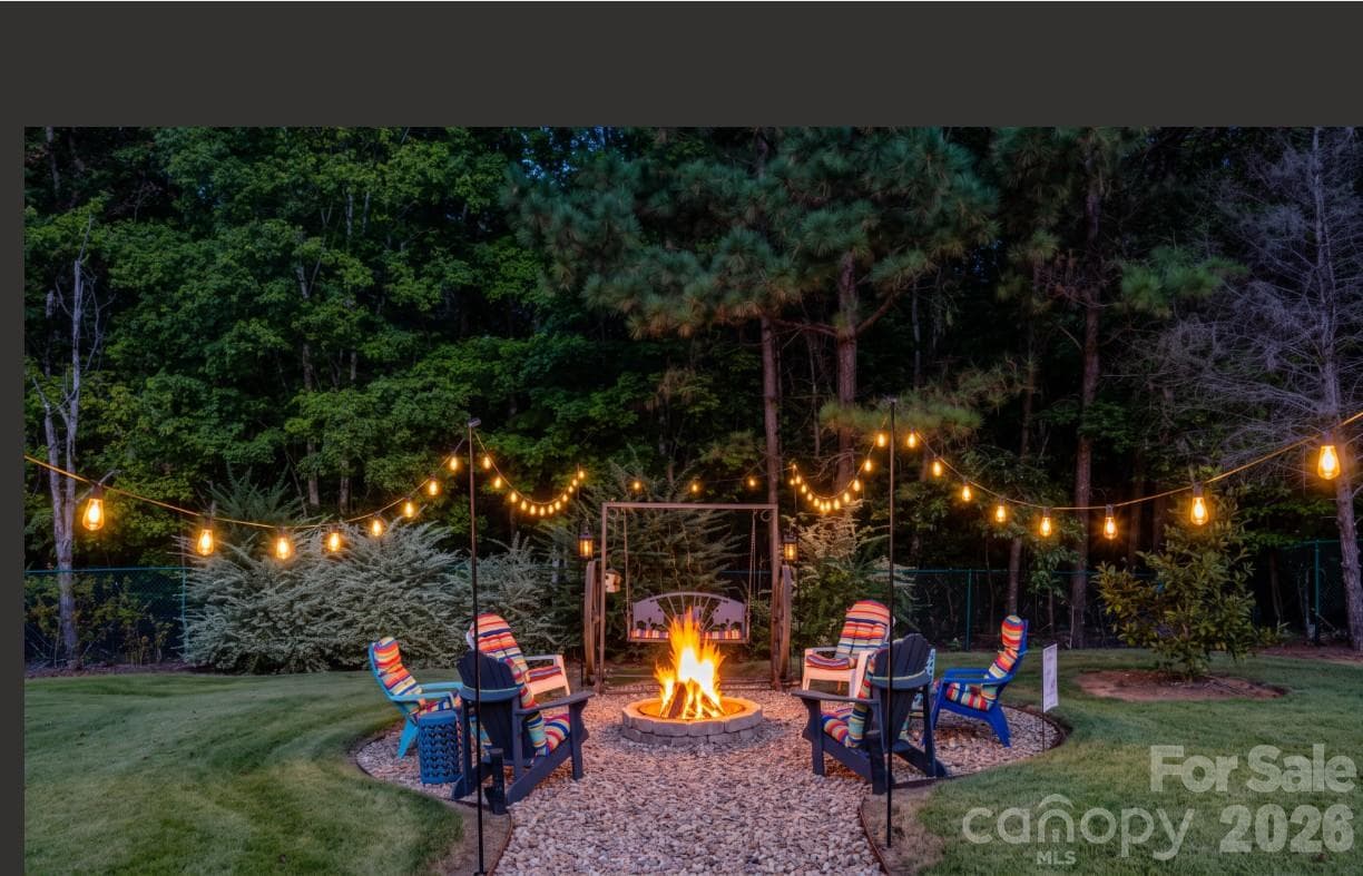 Enhanced nightime lighting of firepit area in backyard... - 571 Newport Drive, Mount Gilead