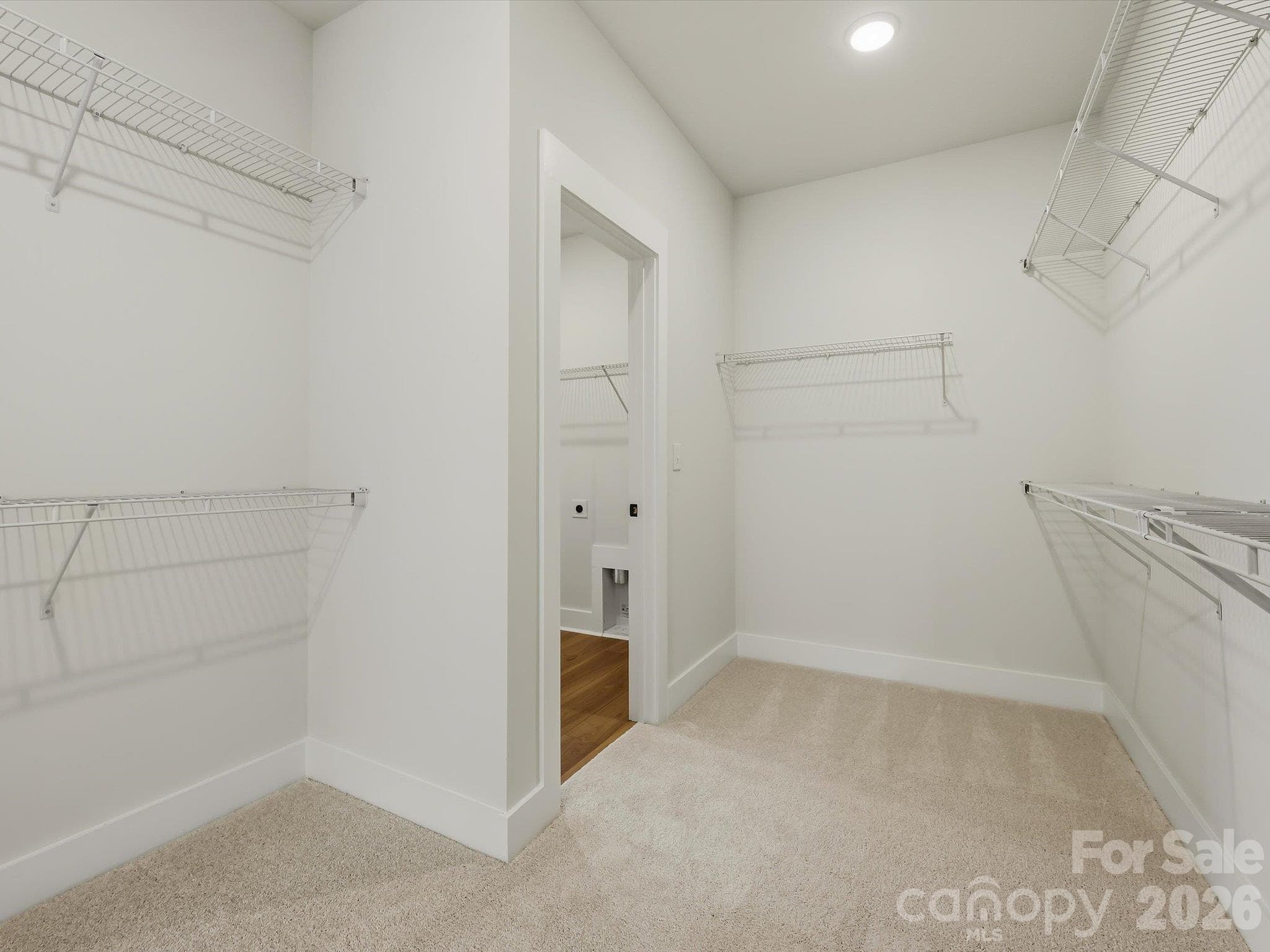 Owner's en suite closet, opens to laundry room - 325 Portree Street, Rock Hill