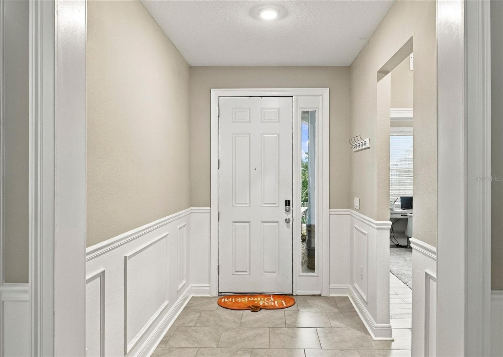 Foyer Featuring Elegant Wall Molding and Decorative trim - 33310 MAJOR OAK DR, WESLEY CHAPEL