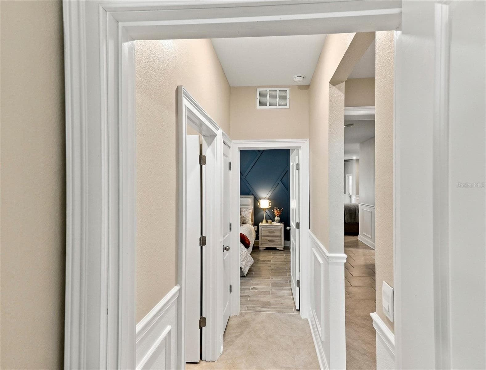 Beautiful Hallway Featuring Decorative Wall Molding and Tile Floor - 33310 MAJOR OAK DR, WESLEY CHAPEL