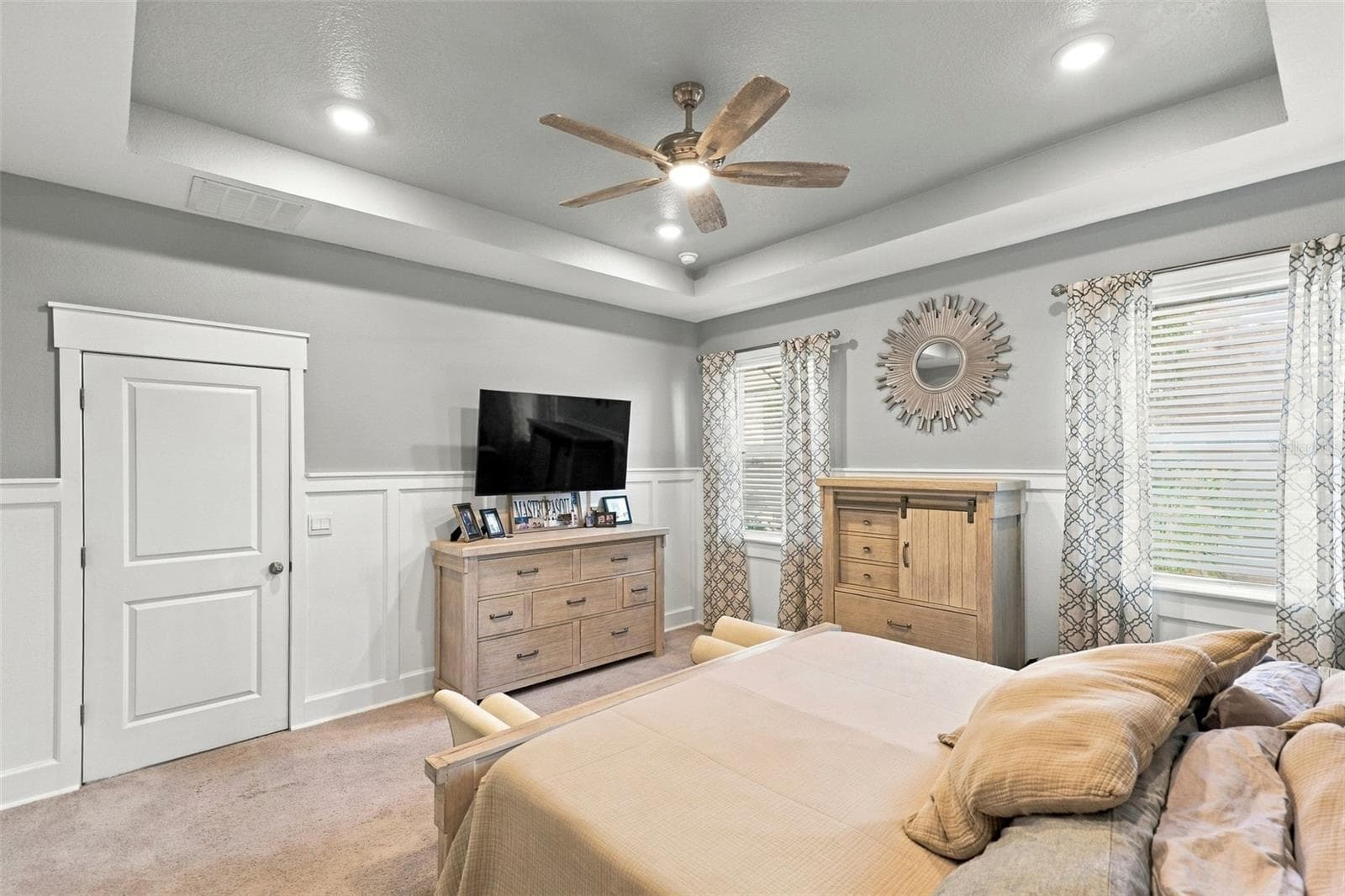 Primary Bedroom Featuring Tray Ceiling and Generous Living Space - 33310 MAJOR OAK DR, WESLEY CHAPEL