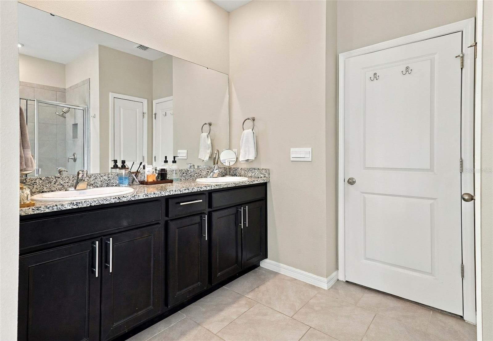 Primary Bathroom with Dual-Sink Vanity and Ample Cabinet Storage - 33310 MAJOR OAK DR, WESLEY CHAPEL