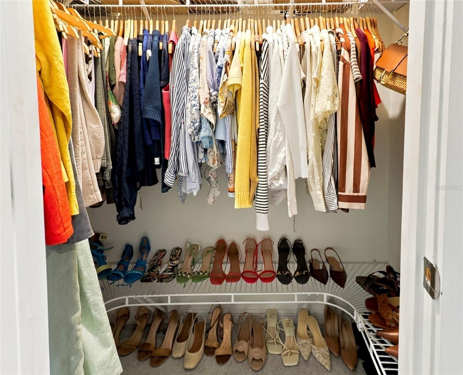 Spacious Walk-In Closet For Her with Built-In Shelving - 33310 MAJOR OAK DR, WESLEY CHAPEL
