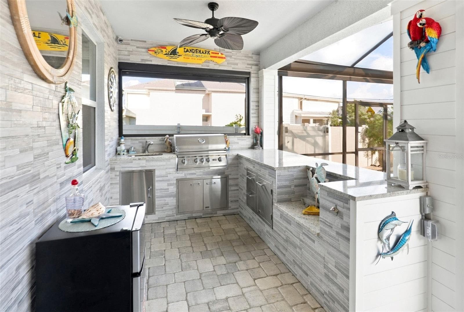 Covered Outdoor Living Area Designed for Relaxation and Entertaining - 33310 MAJOR OAK DR, WESLEY CHAPEL