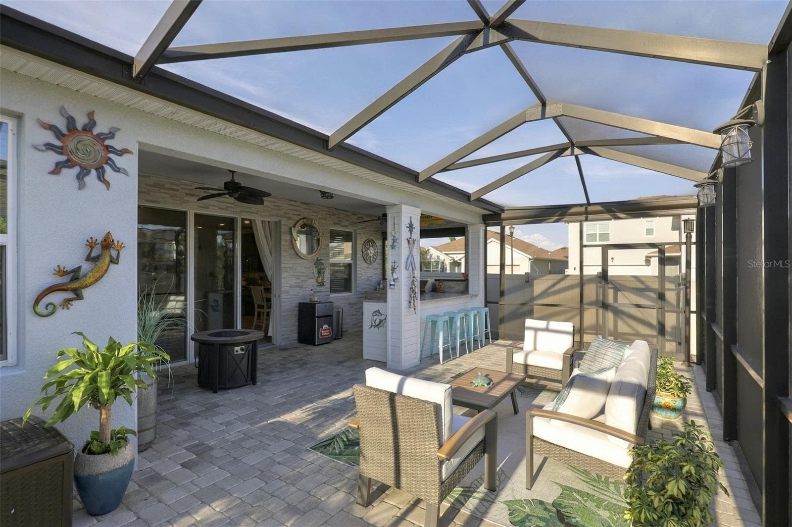 Expansive Screen-Enclosed Patio with Outdoor Entertaining Space - 33310 MAJOR OAK DR, WESLEY CHAPEL