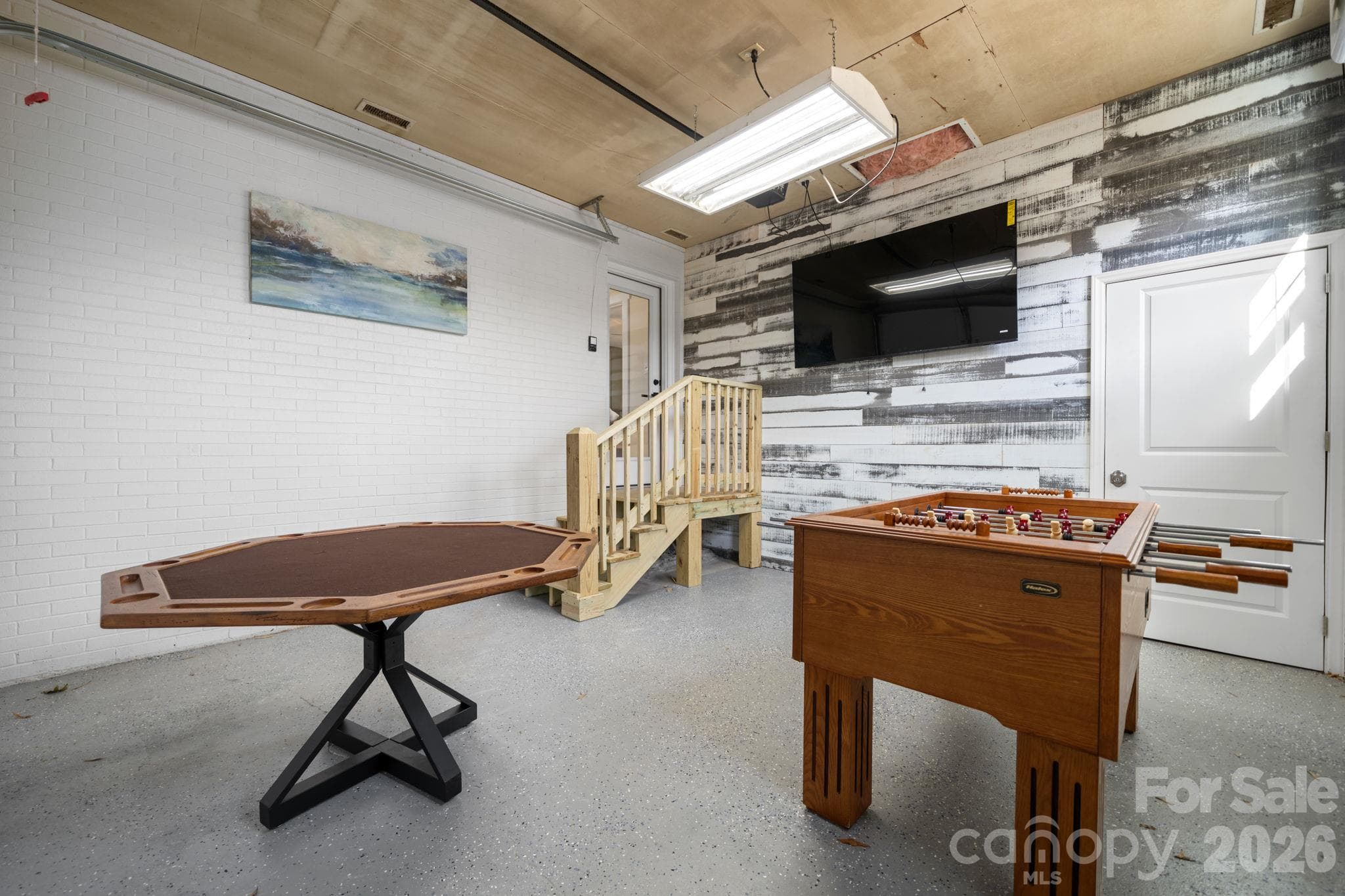 1 car garage area that is currently being converted into a flex space. - 7770 Sherrills Ford Road, Sherrills Ford