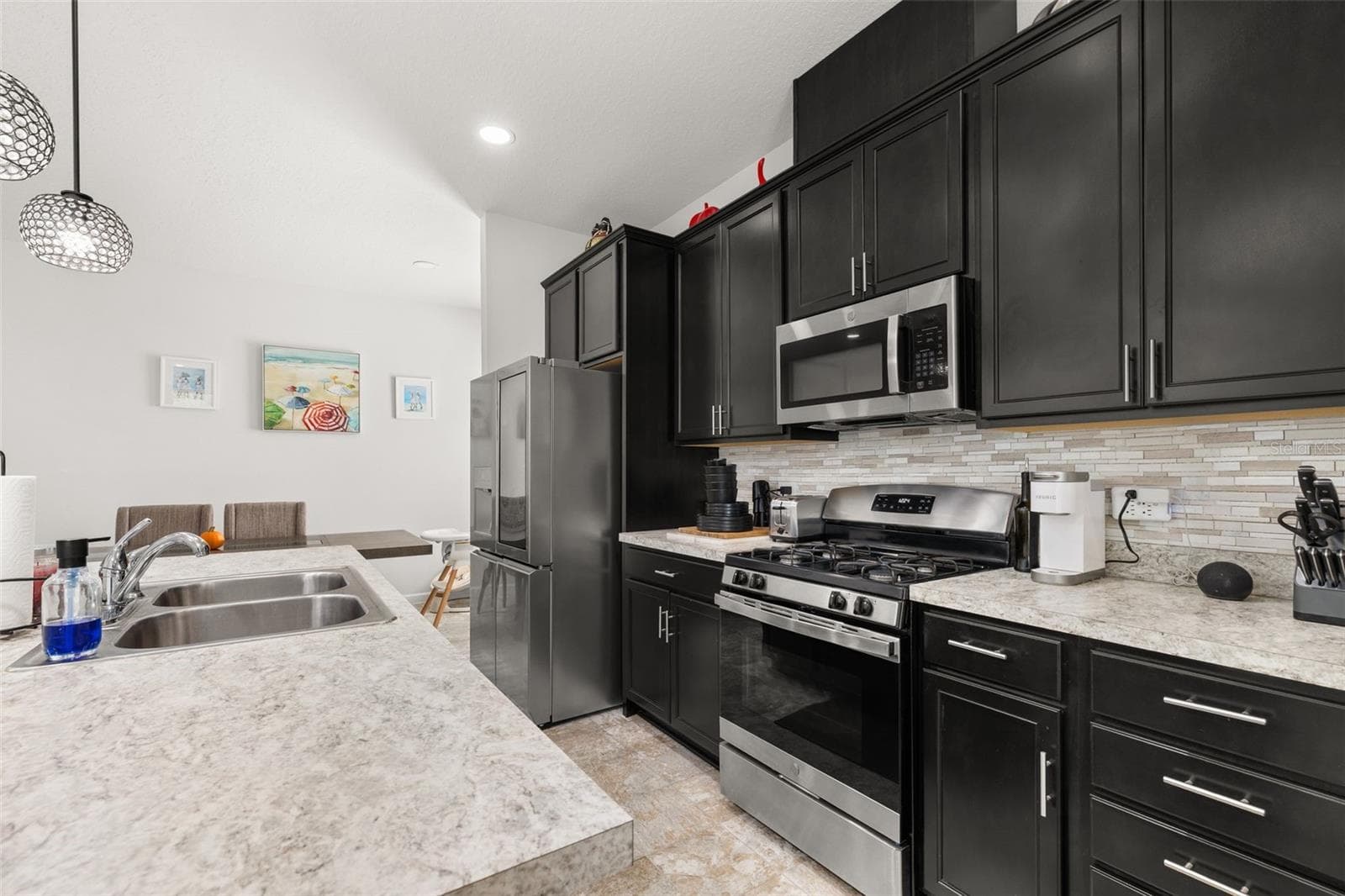 Single Family Residence at 5240 MEADOW SONG DR, OKAHUMPKA, photo 10 of 54