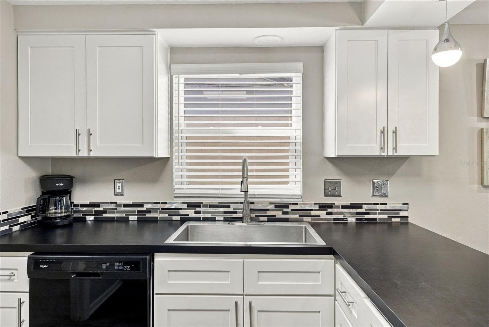 Large Farm-style sink with new faucet and glass-tile backsplash - 16136 FOXFIRE DR, TAMPA