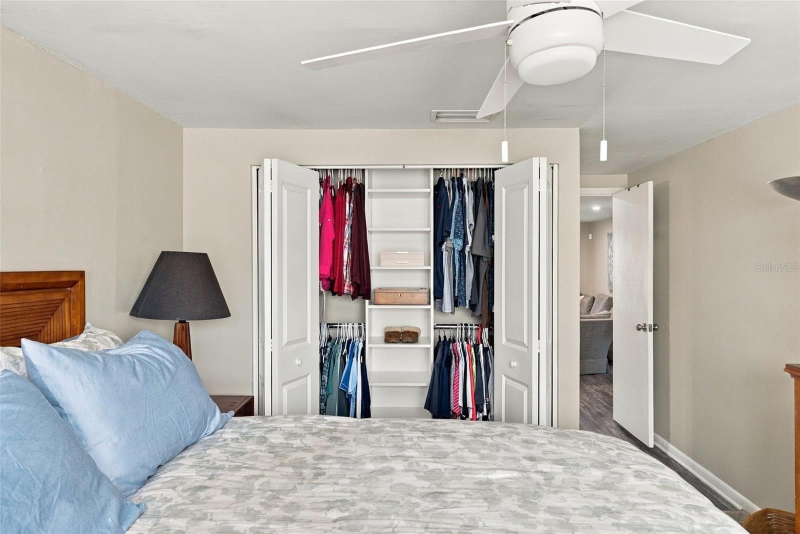 Master closet with custom closet system - 16136 FOXFIRE DR, TAMPA